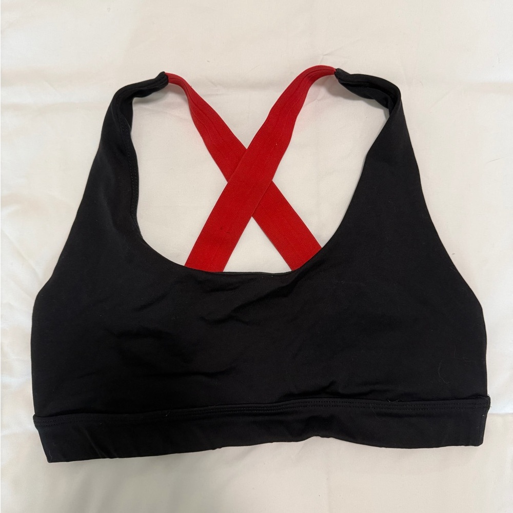 Koral Black Sports Bra with Red Crisscross Straps